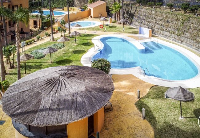 Appartement in Mijas - Oasis | frontline golf, tropisch zwembad