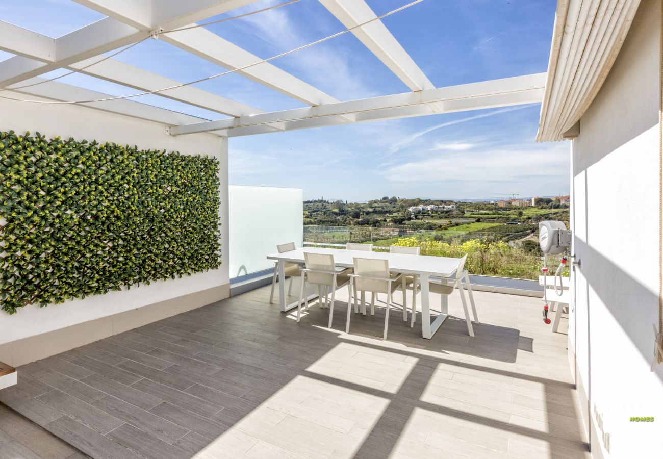 Rijhuis in Estepona - Sonrisa | Golf rijtjeshuis met zwembad in Estepona
