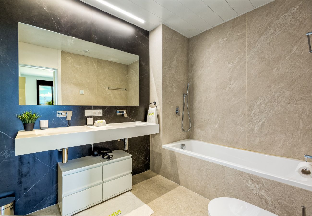 Spain Costa del Sol Torremolinos holiday home Oceana bathroom sink and bath luxurious interior 