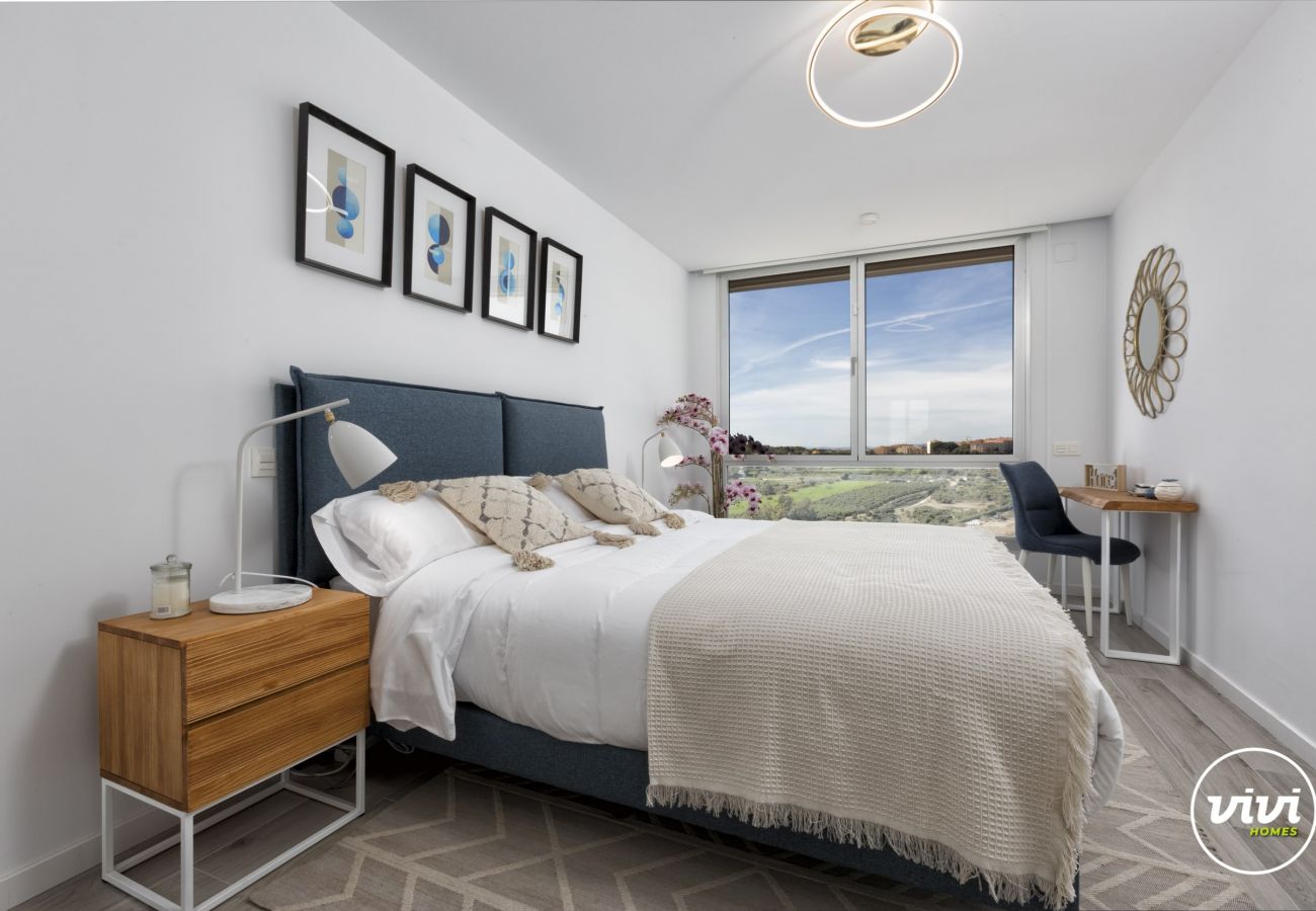 Bedroom with large windows